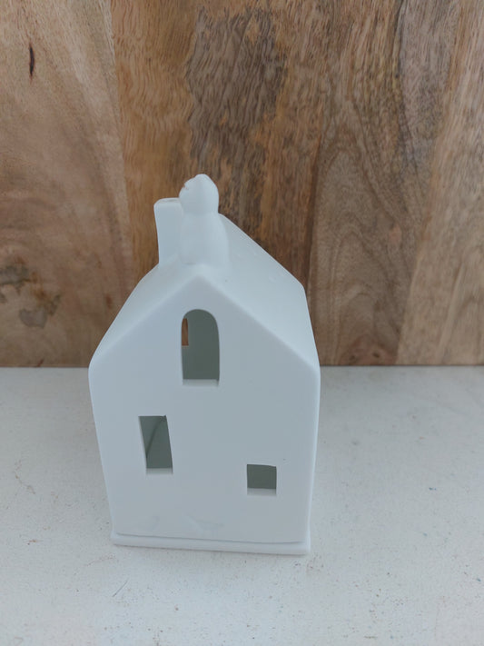 Räder - cathouse. Huisje met poes op het dak.