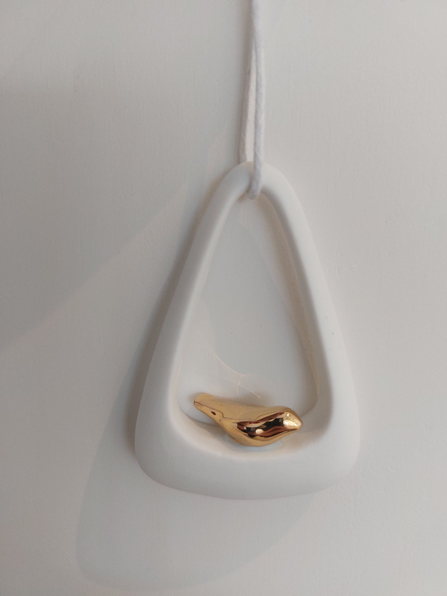 Räder Ornament met goud vogeltje