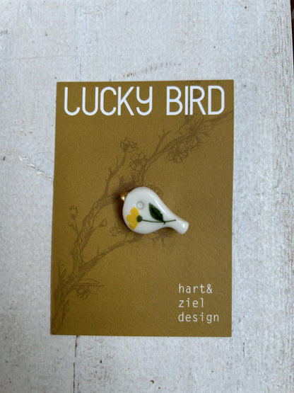Lucky Bird geel bloemetje
