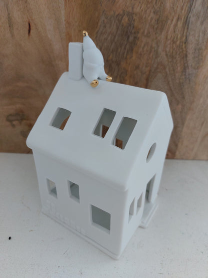 Räder warten auf Rudolfshaus (Haus mit Weihnachtsmann auf dem Dach)