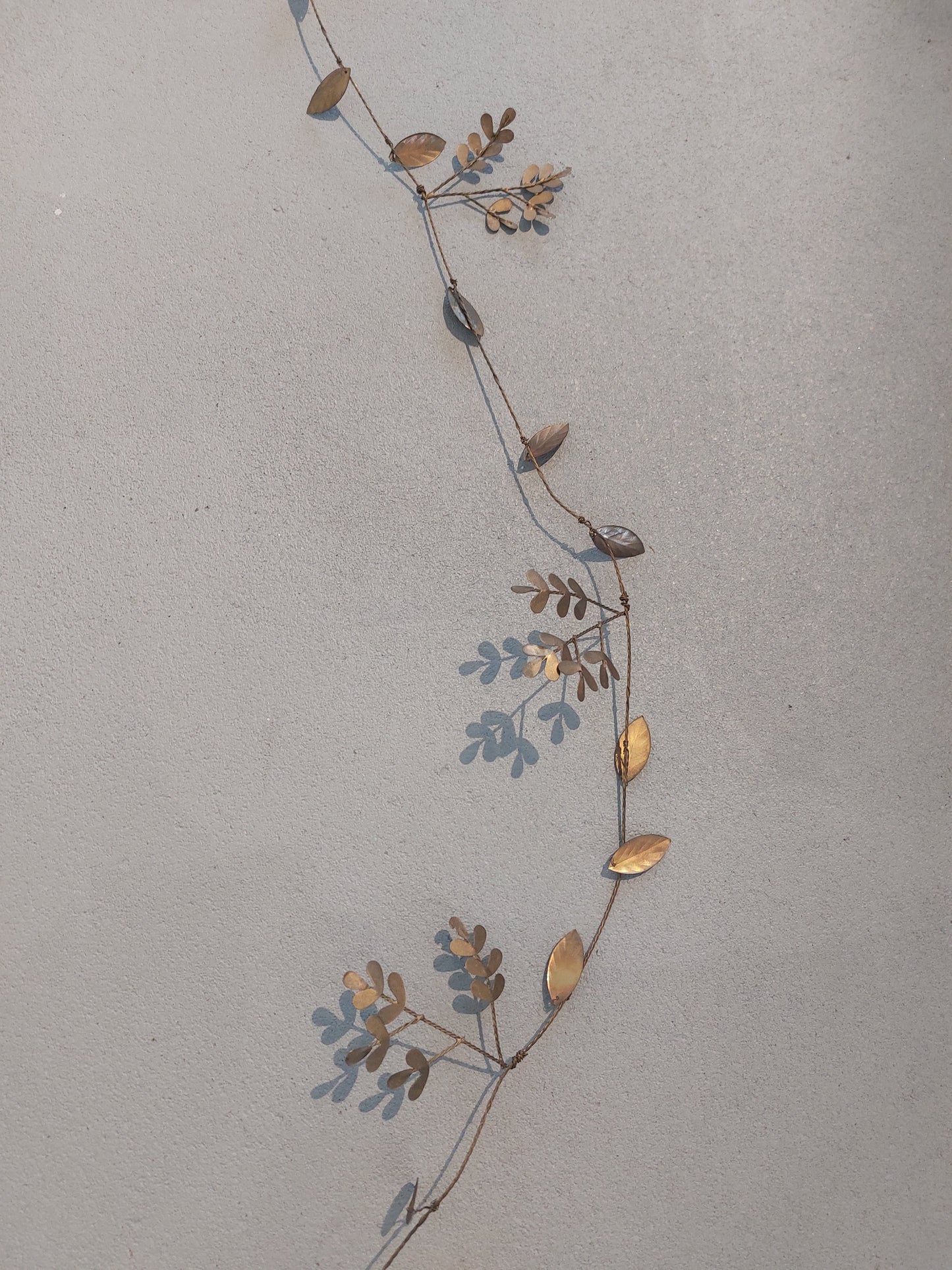 Madam Stoltz slinger/krans met blaadjes