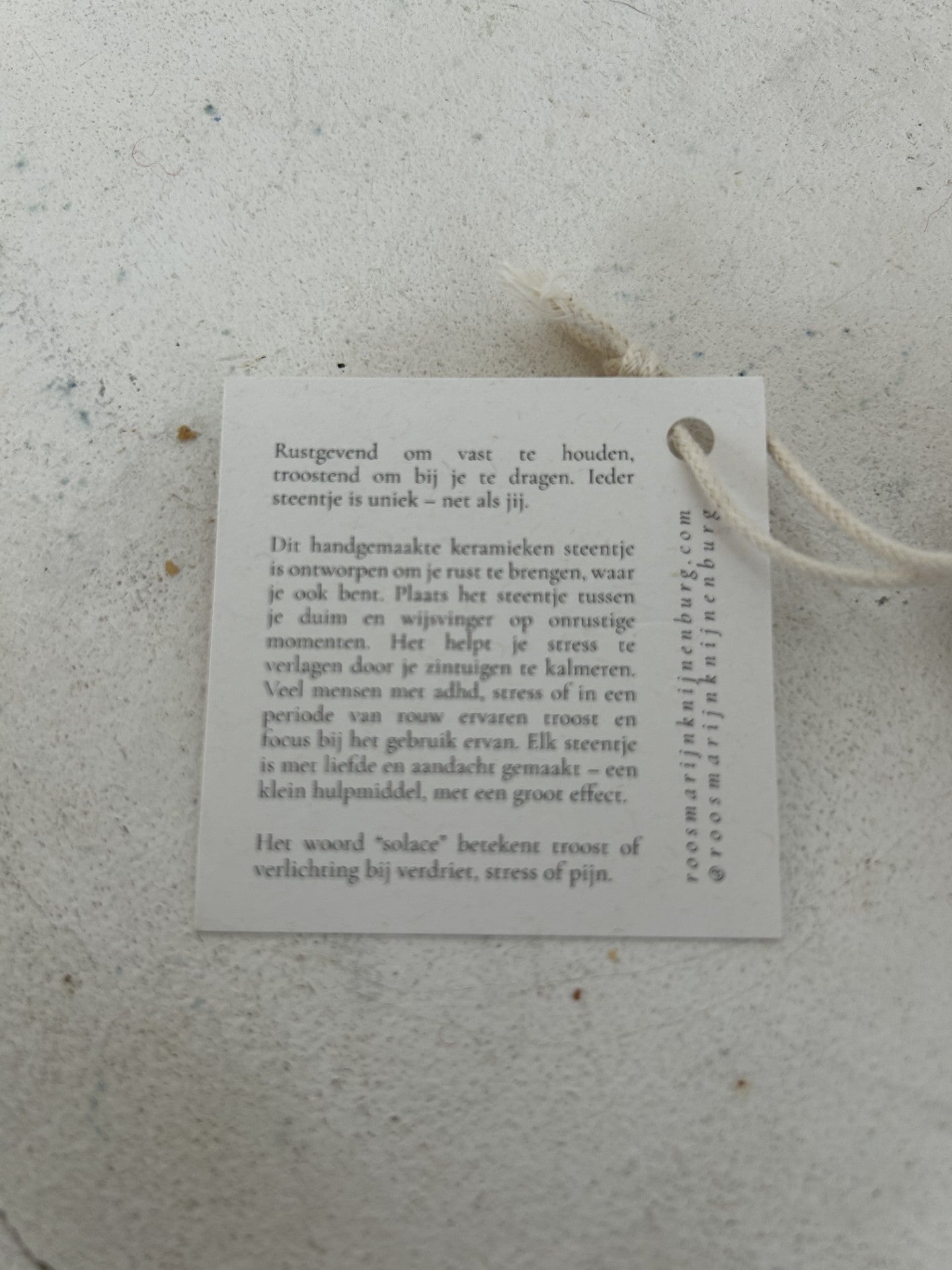 Keramieken "Duim steentje" voor troost