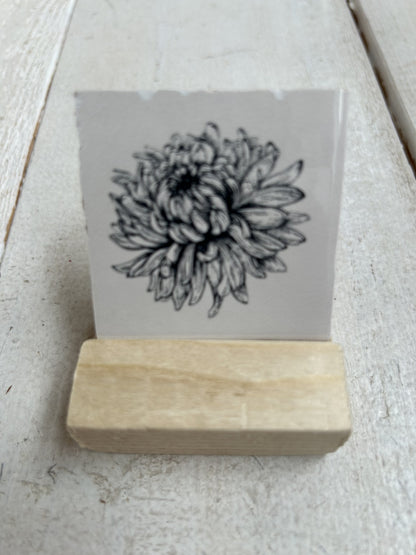Lief tegeltje met een bloem